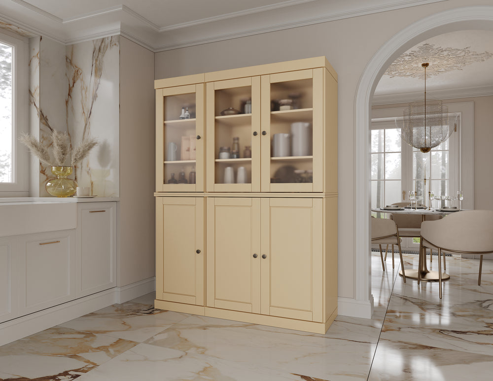 Yellow pantry cabinet with frosted glass doors